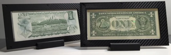 Overlapping view of two 4-mil currency frames showing their black carbon-fiber borders