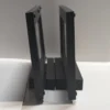 Side profile of two currency frames showing the upright display stands