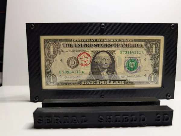 Straight-on front view of a premium currency frame with a sample U.S. one-dollar note