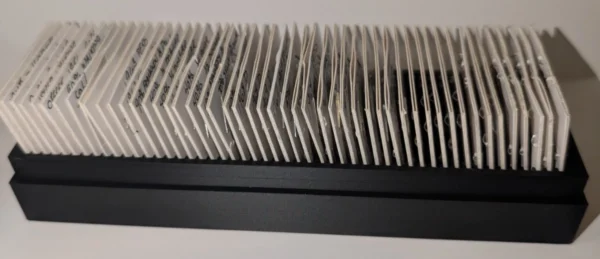 50-Slot 2×2 Coin Flip Storage Box – Divider Close-Up | Serial Shield 3D™ Close-up of the evenly spaced coin-flip divider slots inside the box