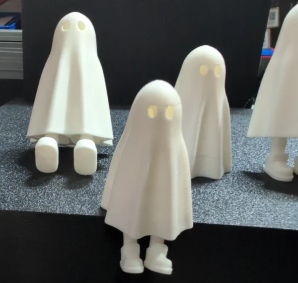 Retractable-Leg Ghost Shelf Sitter Figurines – Four-Ghost Front Group | Serial Shield 3D™ Front group view of four white retractable-leg ghost figurines