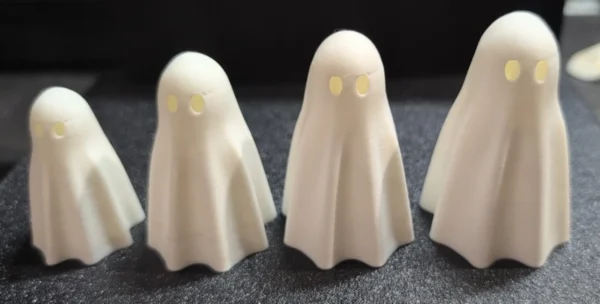 Retractable-Leg Ghost Shelf Sitter Figurines – Two-Ghost Angled View | Serial Shield 3D™ Angled view of two larger white ghost shelf sitter figurines