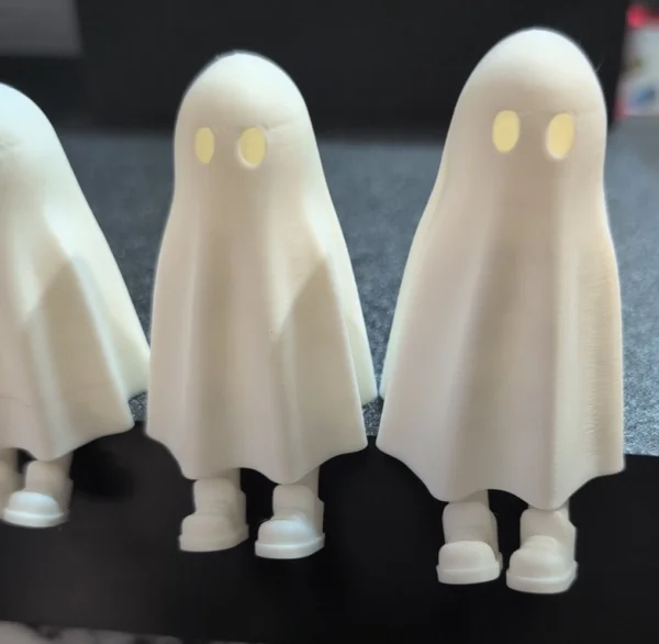 Retractable-Leg Ghost Shelf Sitter Figurines – Shelf-Edge Group | Serial Shield 3D™ Four ghost figurines seated along an edge with their legs extended