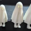 Retractable-Leg Ghost Shelf Sitter Figurines – Shelf Sitter Side View | Serial Shield 3D™ Side-angle view of ghost figurines positioned on an edge to show the shelf-sitter design