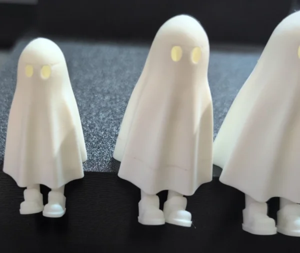 Retractable-Leg Ghost Shelf Sitter Figurines – Shelf Sitter Side View | Serial Shield 3D™ Side-angle view of ghost figurines positioned on an edge to show the shelf-sitter design