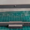 Budget 4-Mil Currency Display Frame with Stand – Empty Stand Front | Serial Shield 3D™ Front view of the empty black display stand on a cutting mat