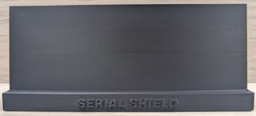 Front view of an empty black graded banknote display stand with Serial Shield 3D™ branding