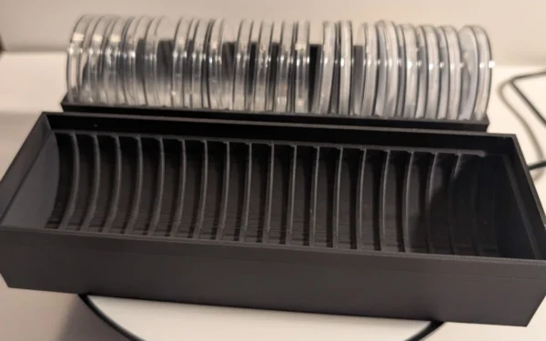 20-Slot 1 oz Coin Capsule Storage Box – Capsule Slot Close-Up | Serial Shield 3D™ Close-up of coin capsules seated in the individual storage slots