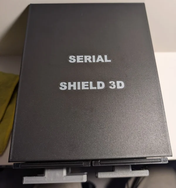 Stackable Coin Capsule and Graded Slab Storage System – Branded Top View | Serial Shield 3D™ Top view of a Serial Shield 3D™ storage unit with the branded lid